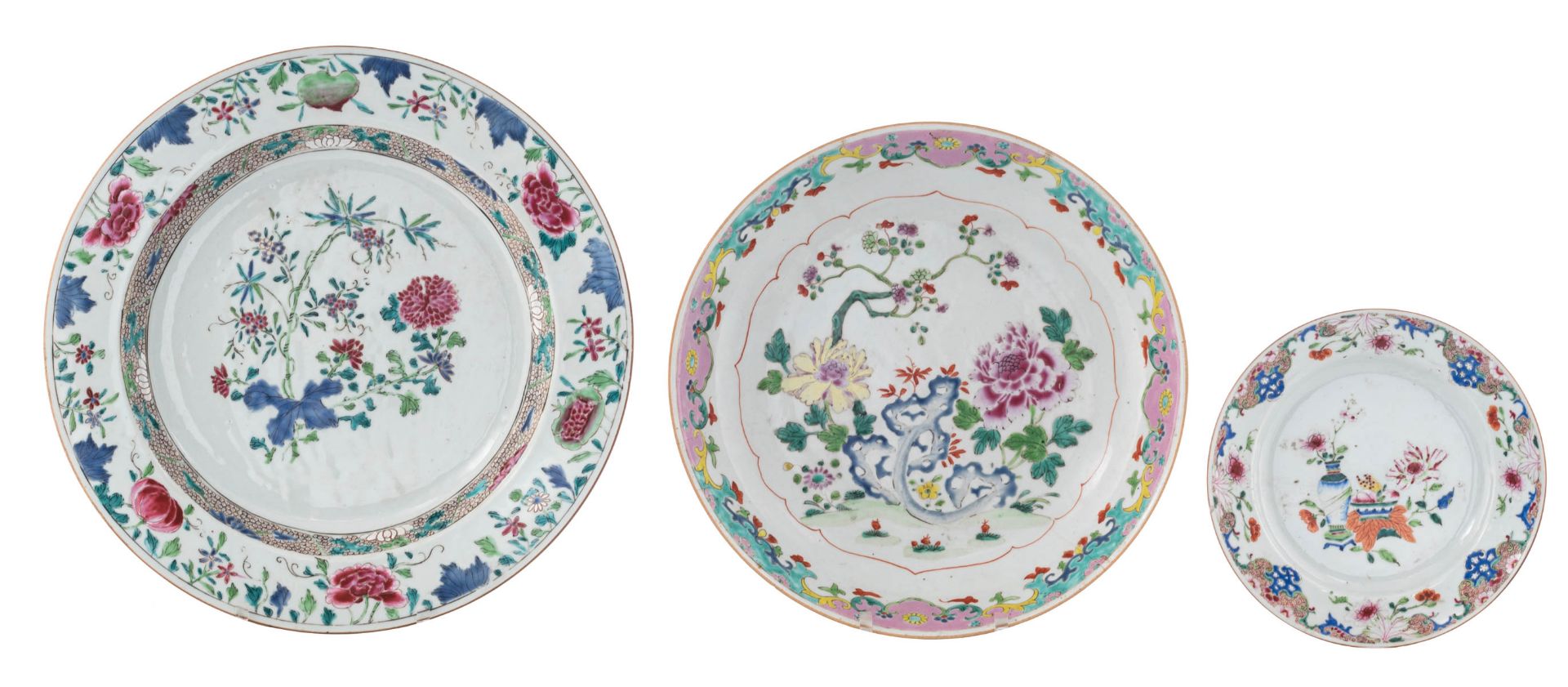 Two Chinese floral decorated famille rose chargers; added a ditto dish