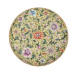 A Chinese famille jaune floral decorated plate