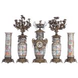 A Chinese Canton famille rose five piece mantle clock garniture