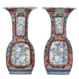A pair of Japanese vases with scalloped rim