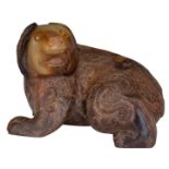 A Chinese archaic-style yellow and russet jade caving of a bear