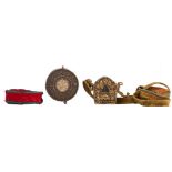 A Nepalese or Tibetan brass and red copper relic shrine; added: a dito silver and red copper relic s