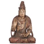 A polychrome paint wooden seated Guanyin in a 'lotus' posture