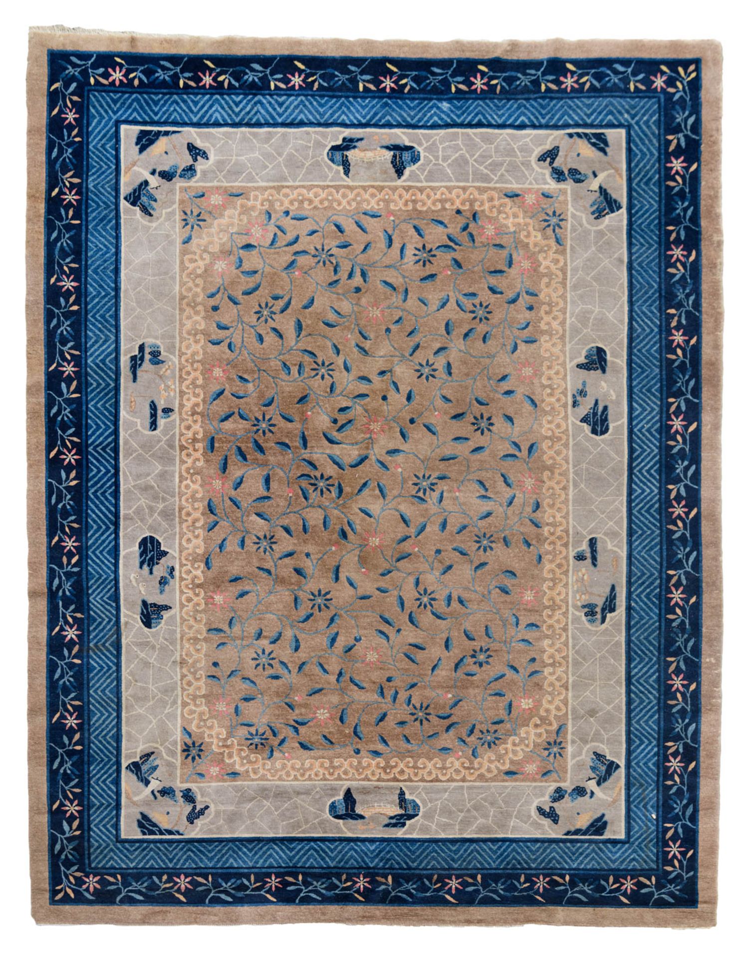 A Chinese rug decorated with stylized floral motifs