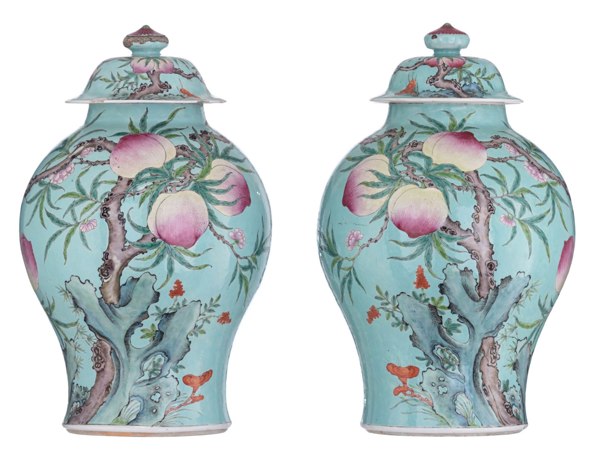 A pair of turquoise ground covered vases