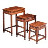 A three piece set of Chinese exotic hardwood matching occasional tables