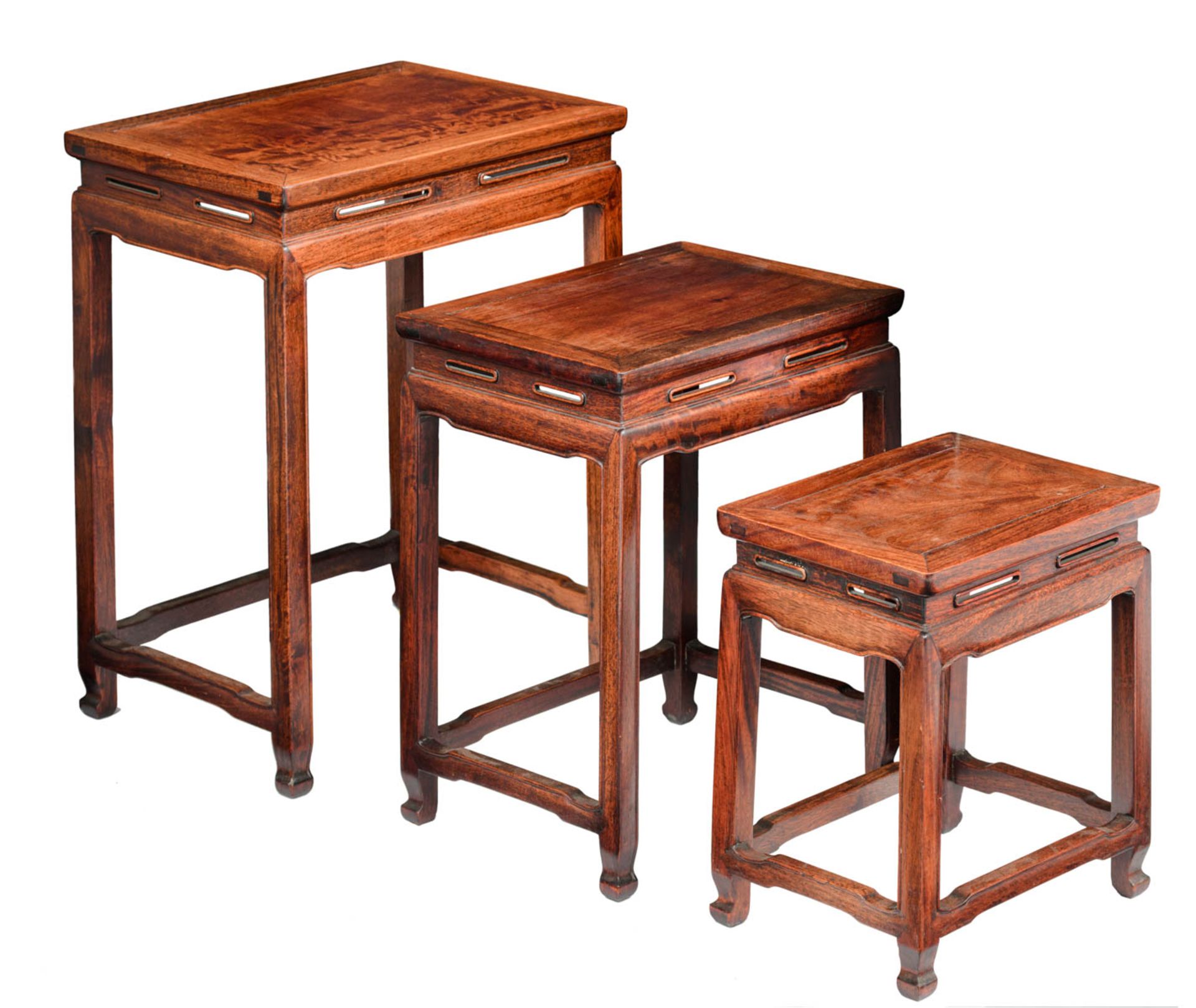 A three piece set of Chinese exotic hardwood matching occasional tables
