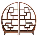 A Chinese mahogany circular display cabinet