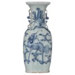 A Chinese celadon ground blue decorated vase