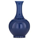 A Chinese monochrome blue-glazed bottle vase