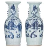 A pair of Chinese celadon ground blue and white vases