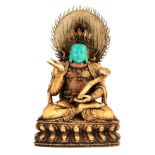 An ivory Sino-Tibetan god in 'Abhaya mudra' posture