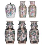A pair of Chinese famille rose relief decorated Nanking stoneware vases and one ditto vase