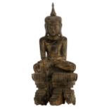 A Burmese black lacquered seated Buddha in 'Bhumisparsa mudra' posture