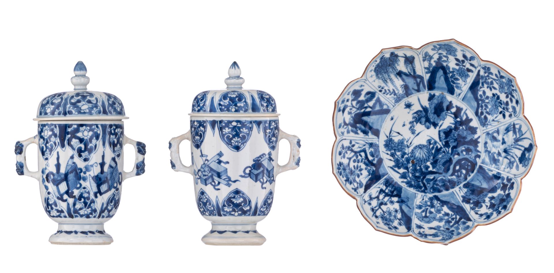 Two Chinese Kangxi period blue and white chalices with covers
