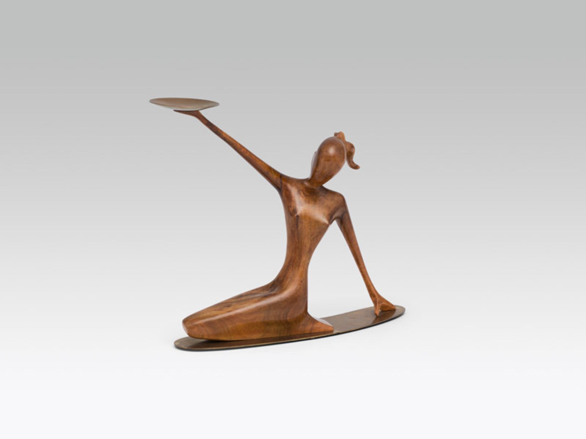 Werkstätten Hagenauer Sitting woman with bowl, design: 1950's