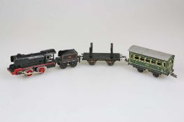 Blechspielzeug Eisenbahn: unbekannte Lok (defekt, L.: ca. 5,9 cm) mit Tender von Kraus Fandor und