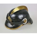 Preußen, Feuerwehrhelm um 1900, Leder, mit Kokarden und Emblem, gelaschtes Lederinnenfutter,