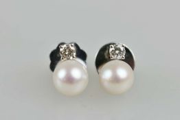 Paar Ohrstecker in 750er WG mit Perle und einem Brillanten in guter Qualität von je ca. 0,18 ct.
