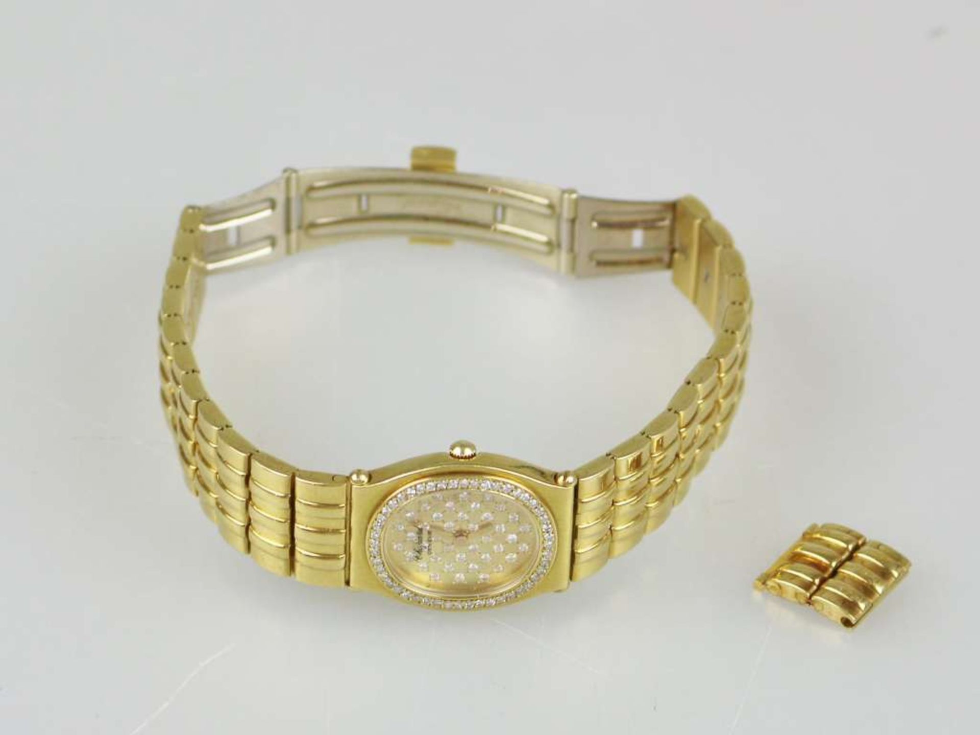 Chopard Damenuhr, Modell Monte Carlo, 750er Gelbgold mit Brillantlünette und Brillantziffernblatt,