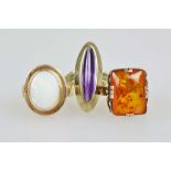 Drei Damenringe, 1 x 585er und 2 x 333er Gelbgold: ein Amethyst in spitzoval gestreckter Form,