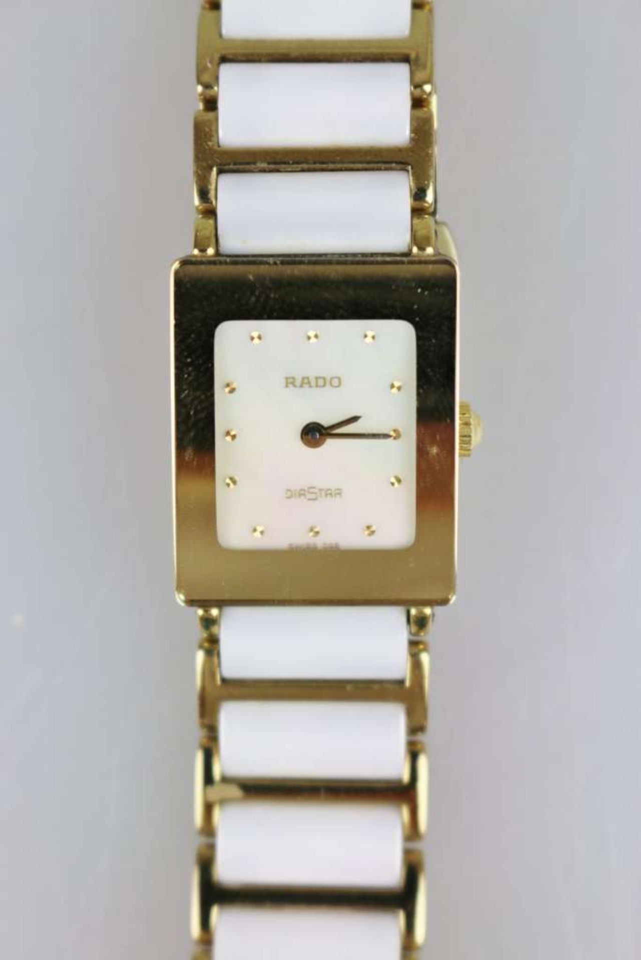 RADO Damenarmbanduhr DiaStar, Edelstahl vergoldet, weißes Keramik-Gliederband, Perlmutt-Ziffernblatt - Bild 2 aus 5