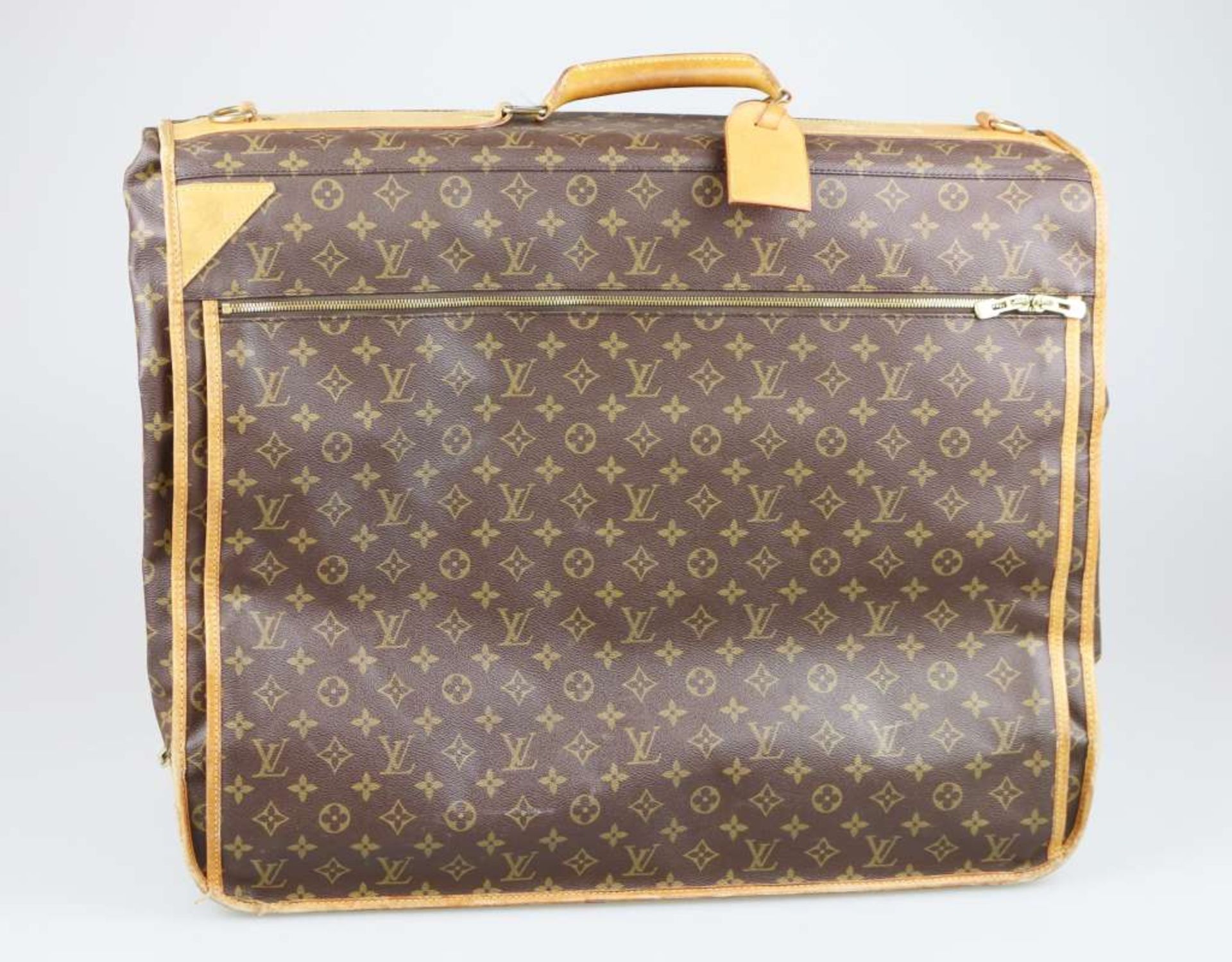 Louis Vuitton, Kleidersack mit Monogramm Canvas, Leder und beschichtetes Leinen, goldene Beschl