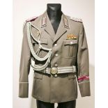 DDR, 2 Uniformen Major der Zivilverteidigung. Gesellschaftsjacke mit Fangschnur und Orden. Abso