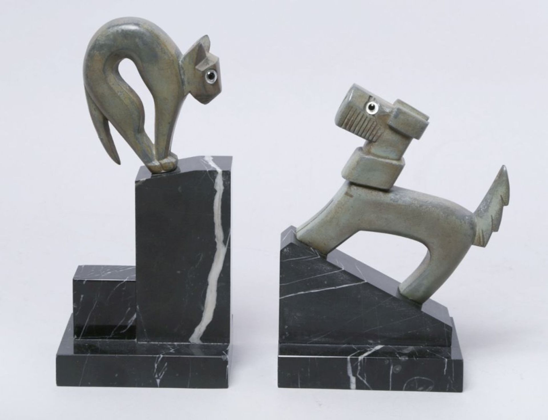 Ein Paar Weißbronze-Buchstützen, "Hund und Katze", Frankreich, um 1920, anonymerBildhauer, schwarzer