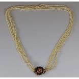 Perlenkette, um 1900, sechsreihig, feine Saatperlchen, Schließe GG 585/gepunzt 14 K, 1 kleiner