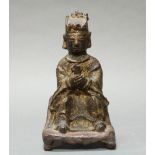 Bronze, "Vergöttlichter Kaiser", China, Ming-Zeit, auf einer Bank sitzend, mit Krone und Zepter,