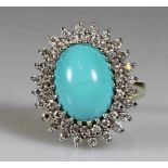 Ring, WG/GG 585, ovaler Türkis-Cabochon ca. 1.30 g, 48 Brillanten zus. ca. 1.0 ct., etwa tw/vsi, 8