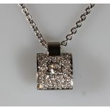 Anhänger, mit Kette, WG 750, Brillanten zus. ca. 1.0 ct., pavé-gefasst, ca. 10 g, 44 cm lang