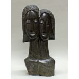 Skulptur, Serpentinstein geschnitzt, "Two sisters", doppelseitiges Gesicht, rückseitig bezeichnet F.