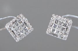 Paar Ohrstecker, WG 750, Diamanten zus. ca. 0.76 ct., etwa fw/vs-si, Brillant- und Princess-Schliff,