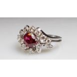 Ring, WG 585, 1 oval facettierter Rubin, 12 Besatz-Diamanten, 4 g, RM 17