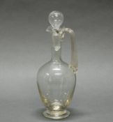 Karaffe, 20. Jh., farbloses Glas, Henkel mit Rillendekor, 29 cm hoch