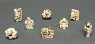 8 Netsuke, "Glücksgötter, Volkstypen, Unsterblicher", Japan, Anfang 20. Jh., Elfenbein,