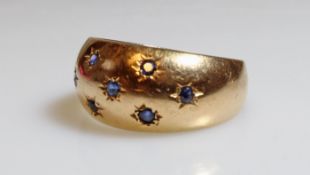 Ring, sog. 'Sternenhimmel', GG 750, 7 kleine facettierte Saphire, 3 g, RM 16.5