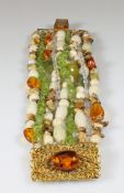 Modeschmuck-Armband, 9 Stränge, Bernstein, Peridot, Achat, Jade, Glas, u.a.m., vergoldete