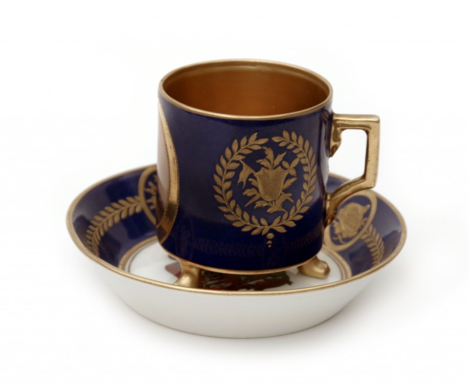 An Empire Style Cup and SaucerPorcelain, cylindrical shaped cup with a bracket handle raised on - Image 2 of 6