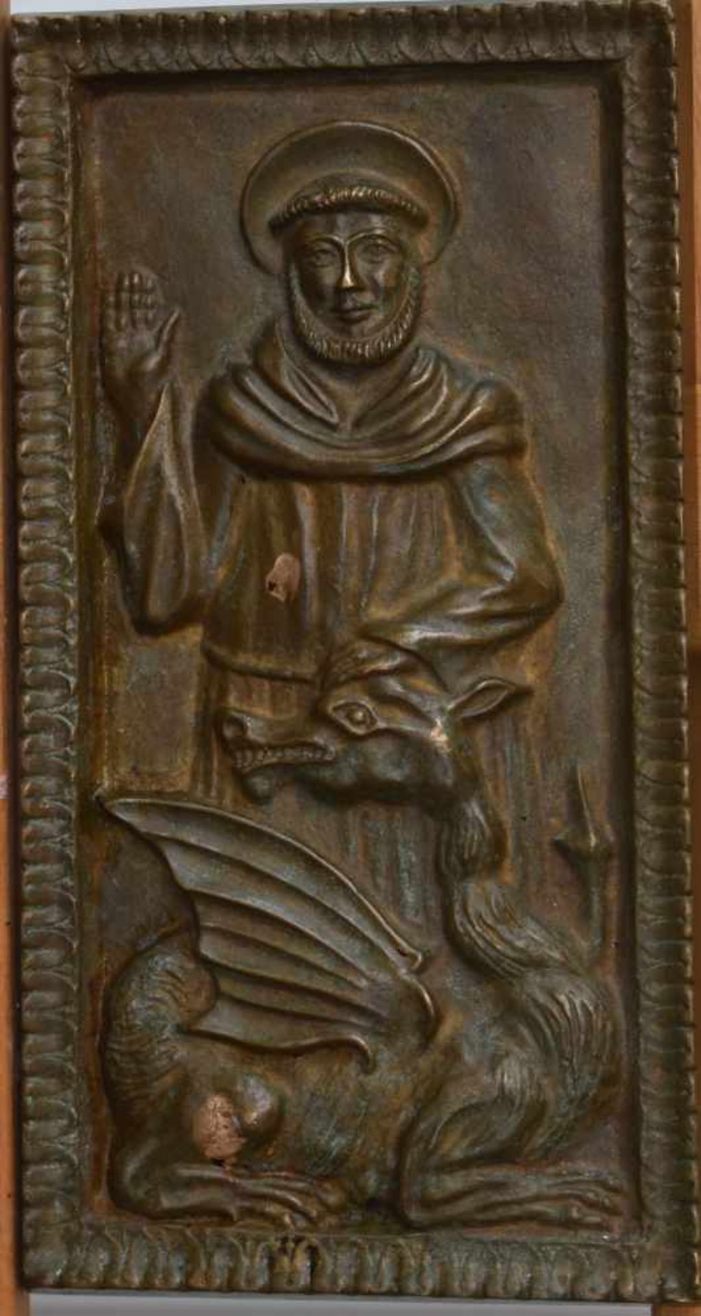 Bronzerelief "Heiliger mit einem Drachen"