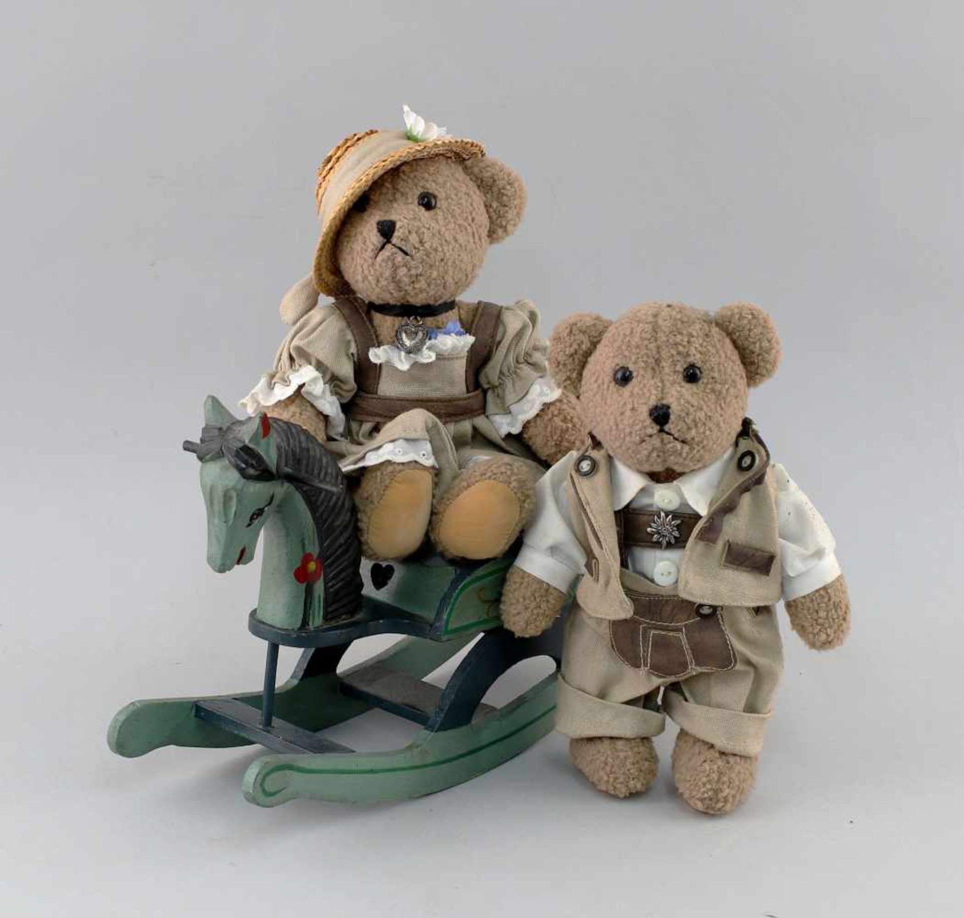 2 Teddys mit Schaukel-Pferd