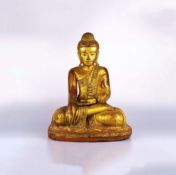 Buddha im Mandalay-StilMyanmar, wohl 19. Jh., Holz, farbig und gold staffiert, mit zahlreichen