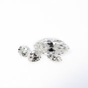 Konvolut Diamant und Zirkonia4-tlg., ein Diamant im Navetteschliff, ca. 0,23 ct, E-F, vvs; ein