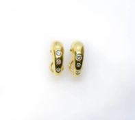 Paar Ohrstecker750 Gelbgold, punziert, mit 6 Brillanten, gesamt ca. 0,38 ct, H-I, vs, Länge 22 mm,