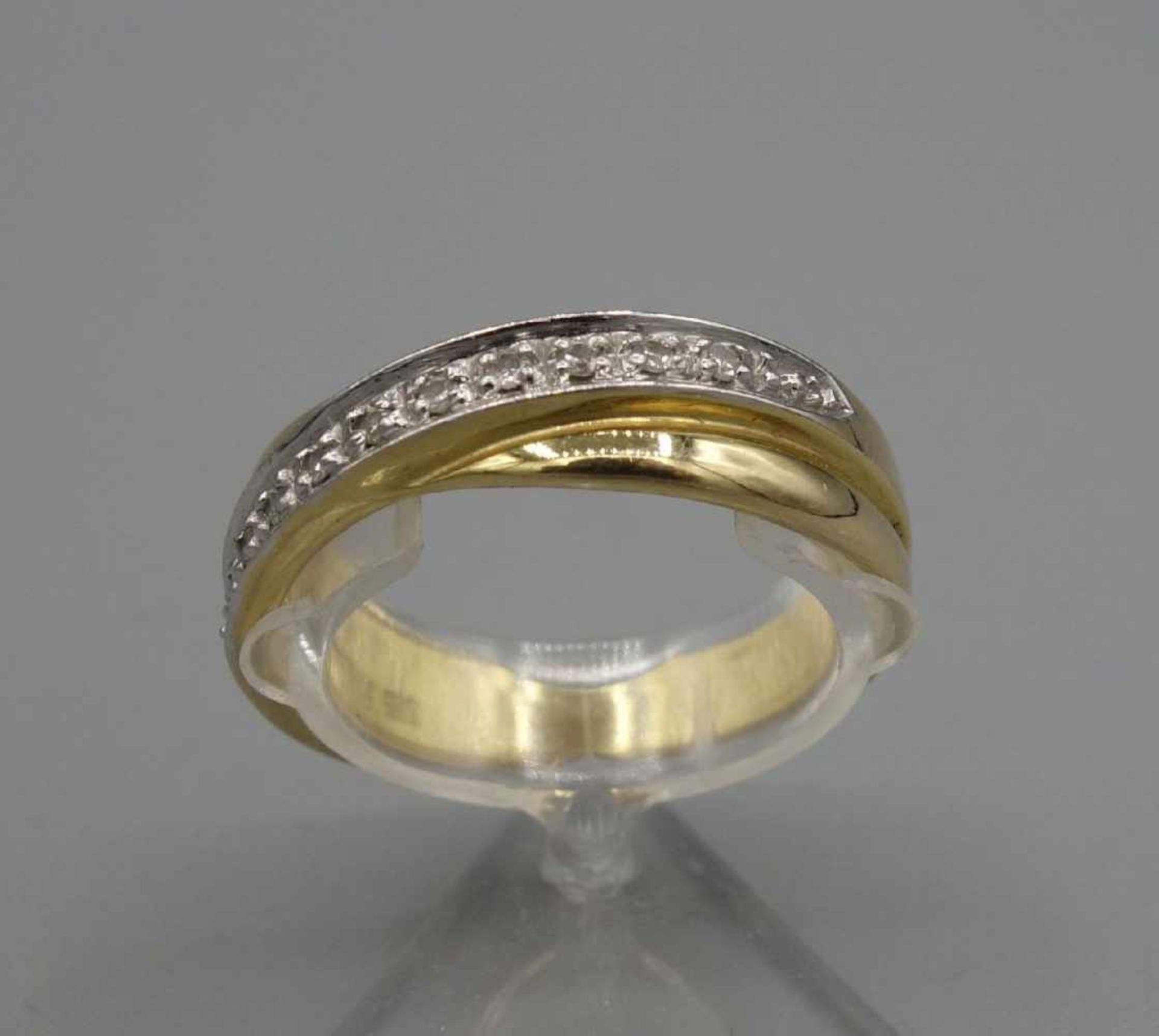 RING mit gekreuzter Ringschiene / crossover ring, 585er Gelbgold (4,6 g), besetzt mit 10 kleinen