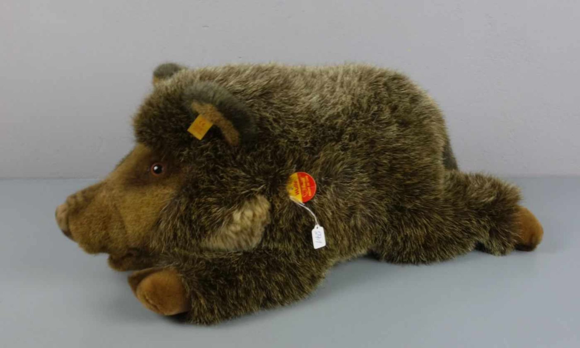 STEIFF - TIER WILDSCHWEIN: "Wulle" / fluffy toy, mit Manufakturfahne, "Knopf im Ohr" und Etikett. L.
