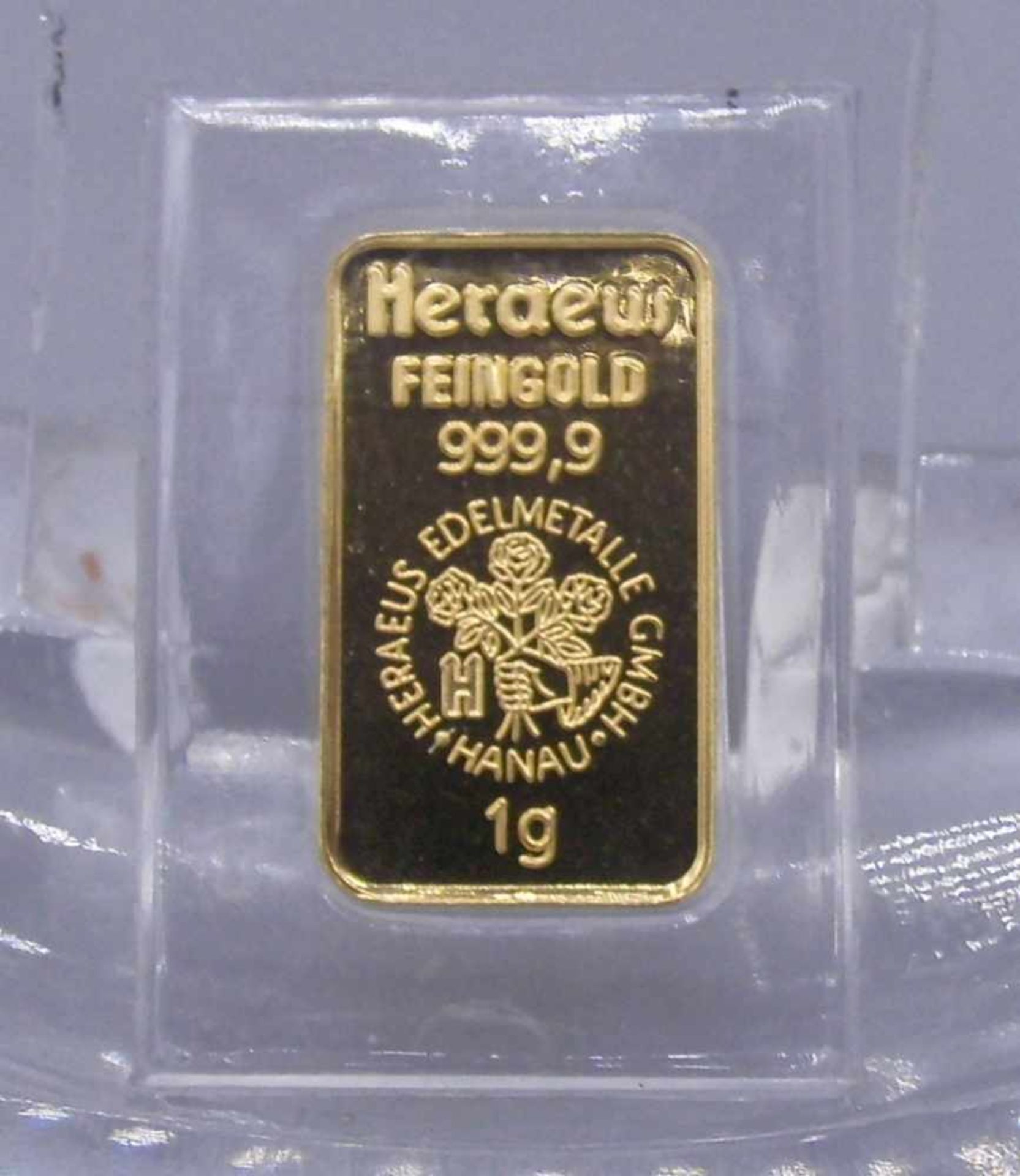 GOLDBARREN "HERAEUS", 999,9er Feingold (1 g). Gravur vorderseitig: Heraeus Feingold 999,99, darunter