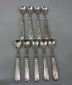 9 KAFFEE -, TEE - ODER DESSERT - LÖFFEL / 9 silver spoons, gefüllte Griffe aus 800er Silber,